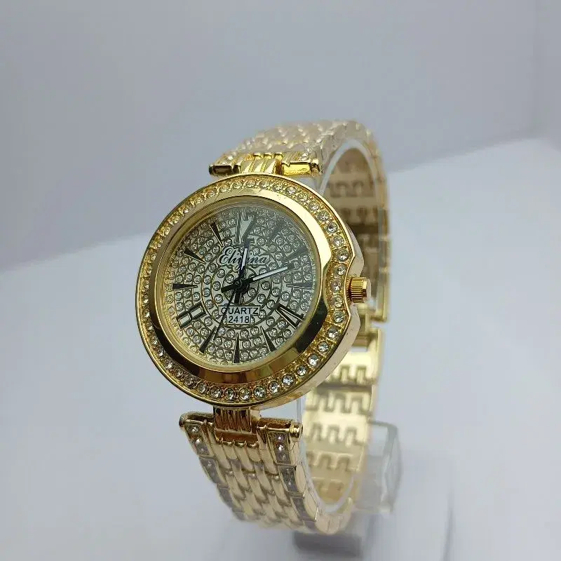 Fashionable Watch For Women || Eliyina New Model Stainless Steel Gold Strap Roun White Stone Curved Dial Quartz Movement Waterproof Wrist Watch For Women