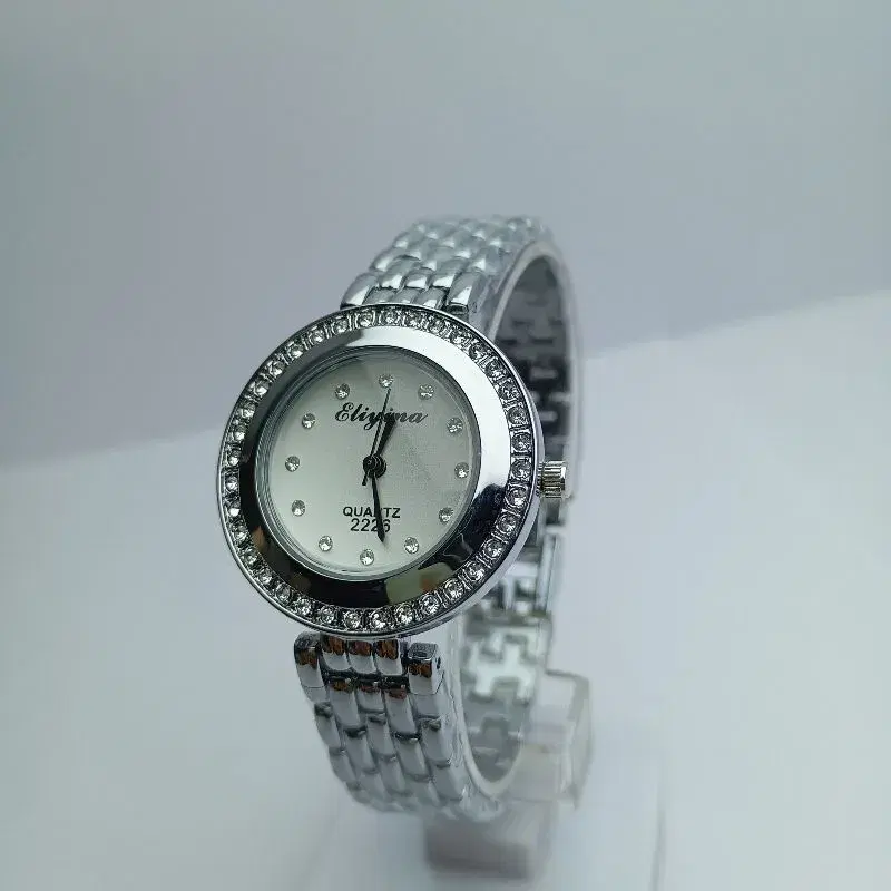 New Design Fashionable Bengal Watch For Women || Eliyina Steel Silver Strap Round White Stone Curved Dial Quartz Movement Waterproof Wrist Watch For Women