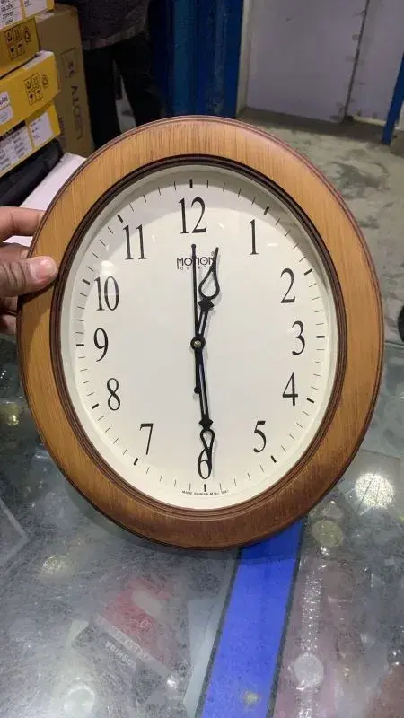 Oval Shape New Wall Clock 27/30 cm