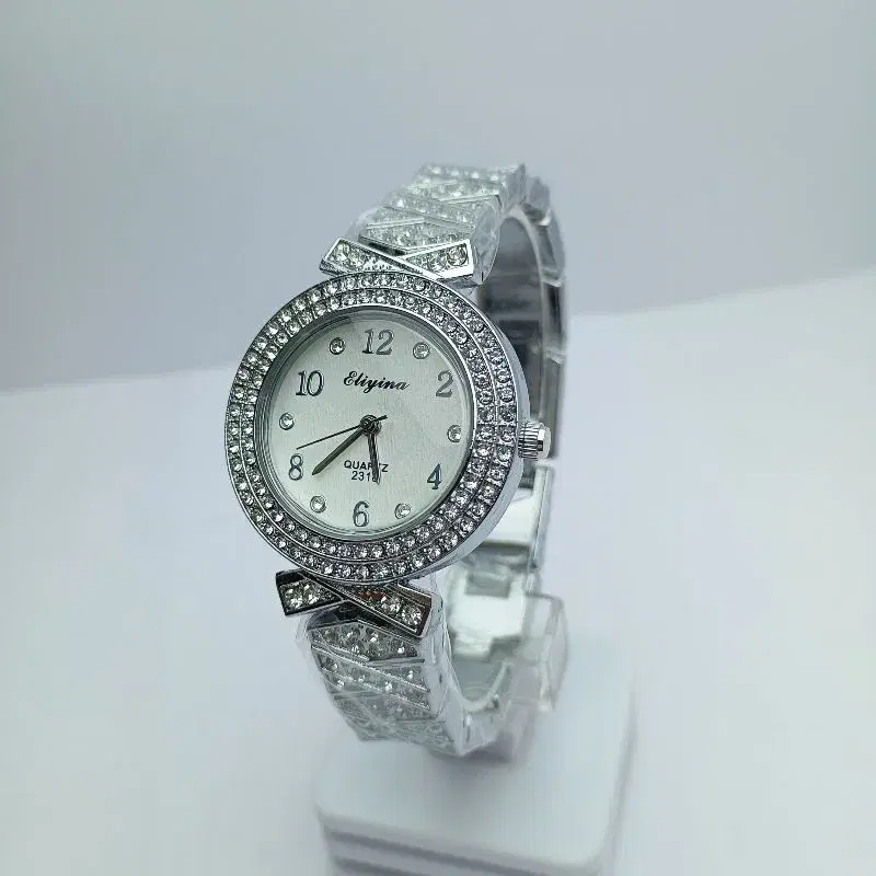 Fashion Bengal Watch For Women || Fashionable Stainless Steel Silver Chain Round Numbering White Dial Stone Curved Quartz Movement Waterproof Watch For Women