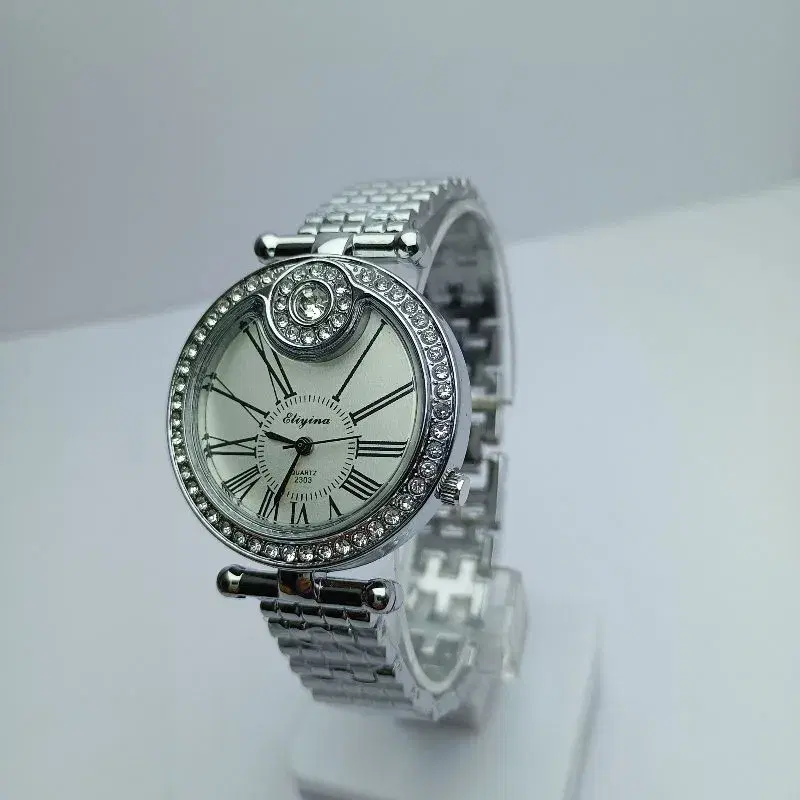Stone Curved Fashionable Watch For Women || Roman Numbering White Dial Quartz Movement Stainless Steel Silver Chain Waterproof Fashionable Wrist Watch For Women