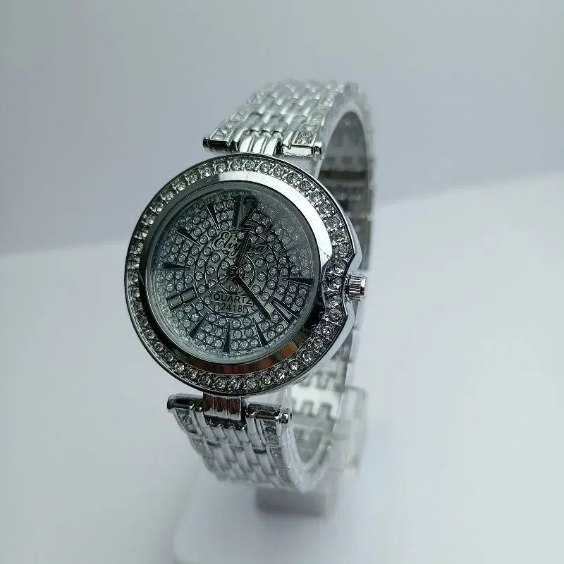 Fashionable Watch For Women || Eliyina New Model Stainless Steel Silver Strap Roun White Stone Curved Dial Quartz Movement Waterproof Wrist Watch For Women