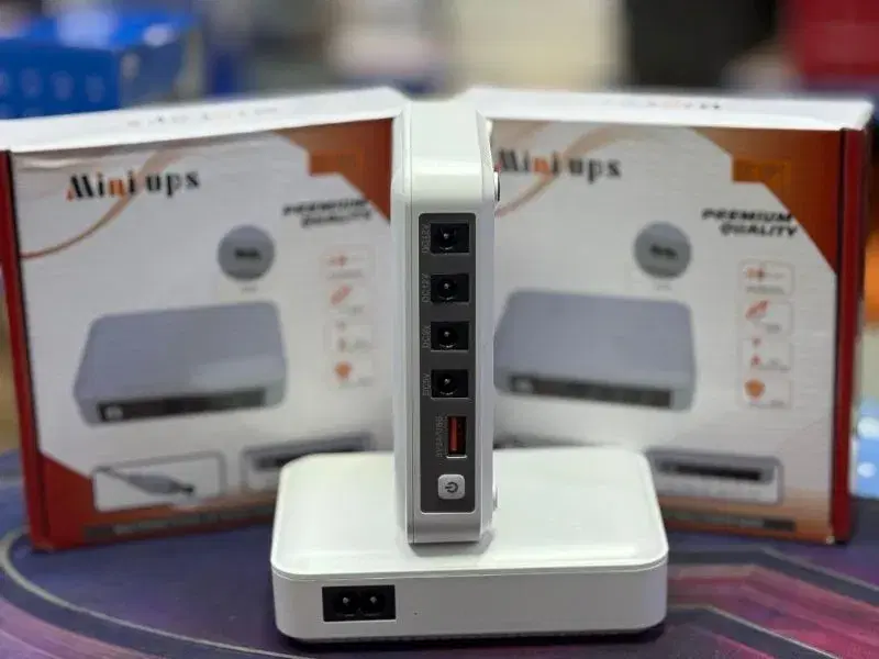 Mini ups 5v2a/usb Dc 12v 9v 12v 7500 mah|| 6 months Warranty.