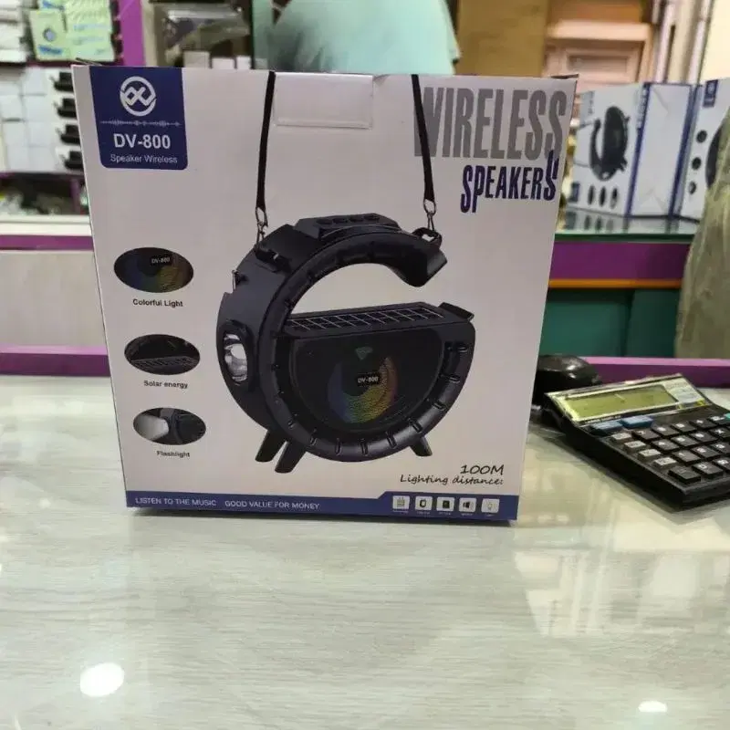 DV-800 G-shaped Colorful Atmosphere Light Flashlight Solar Wireless Bluetooth Speaker.