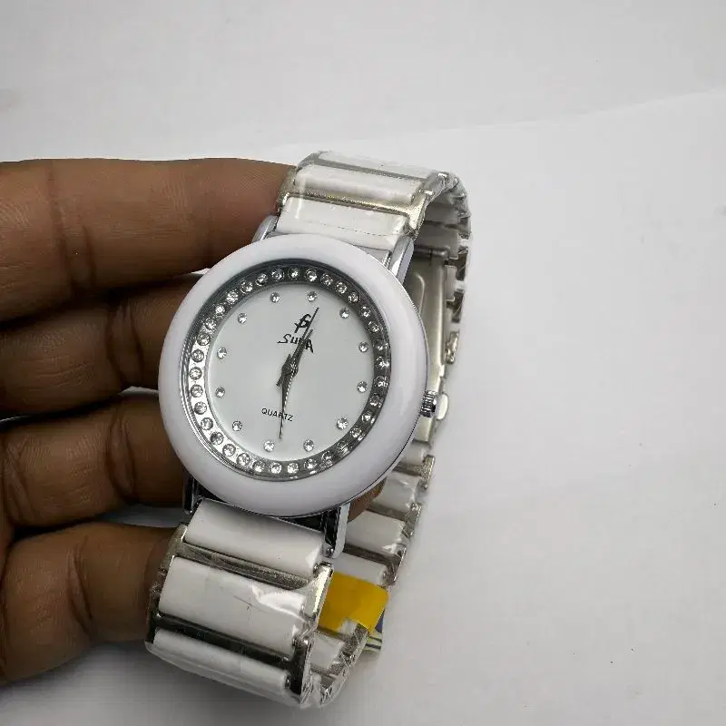 White Dail Ceramic Material Water Proof Watch For Women Fashinable Round Shape