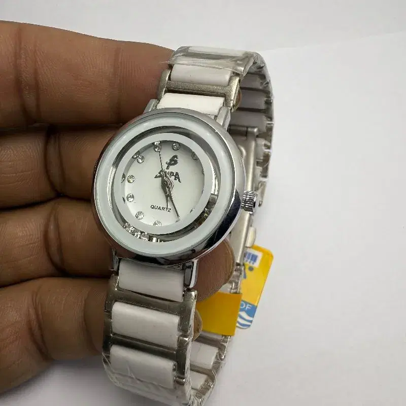 Ceramic Material Water Proof White Dail Watch For Women Fashinable Round Shape