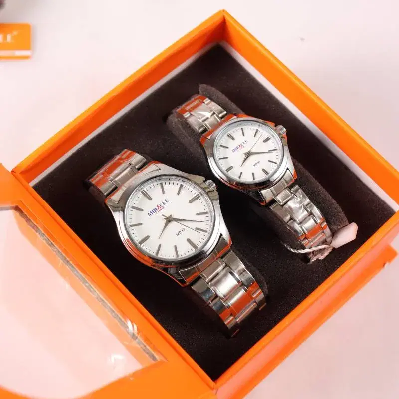 Miracle M030 Round Dial stainless Steel Couple watch without box.