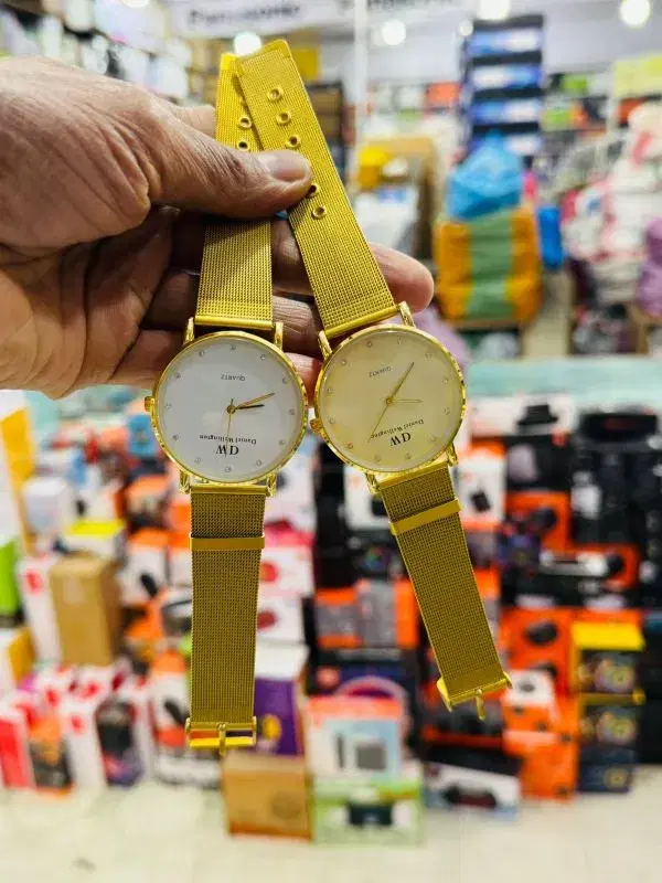 DW Quartz Round Dial Stainless Steel Strap Watch For Women.