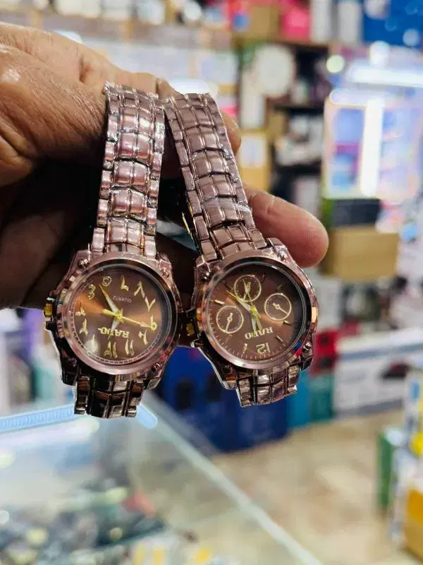 rose gold-toned quartz watches with stainless steel bands