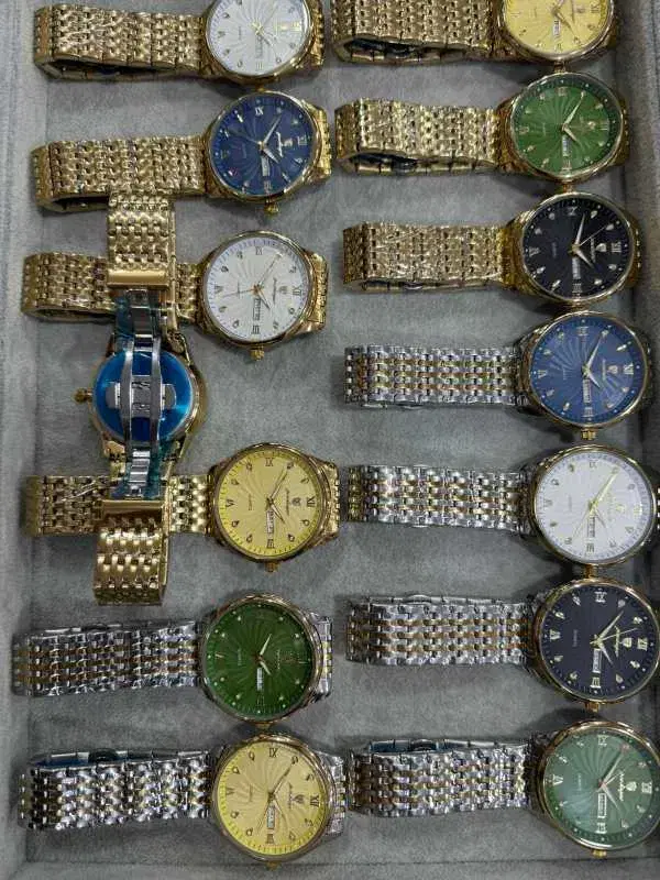 gold toned poedagar men's Quartz watch with a stainless steel band