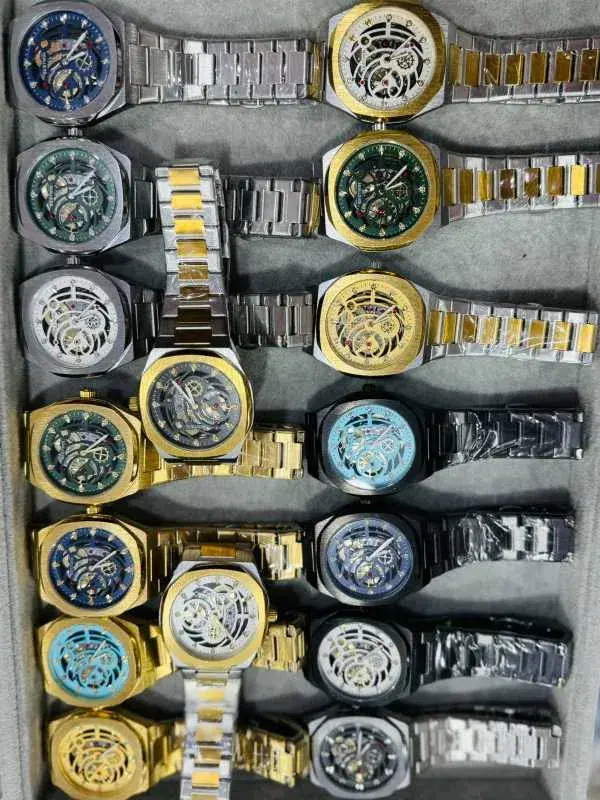 bestwin men's Quartz wristwatch with gold-tone stainless steel band and a skeleton dial