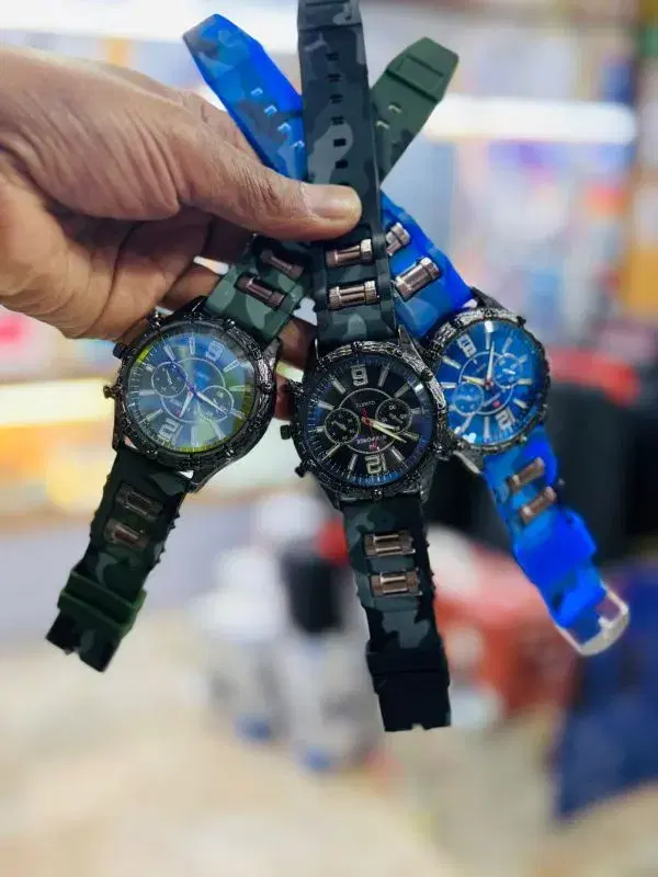 Naviforce men's watches with camouflage-patterned rubber straps.