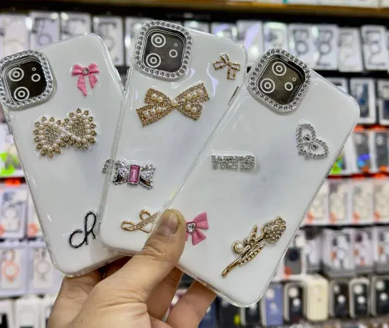 decorative, transparent phone cases, likely for iPhone models.