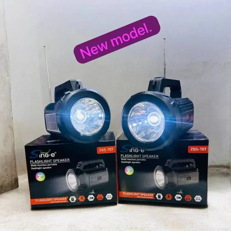 Sing-e ZQS-T07 multi-function portable flashlight speaker.