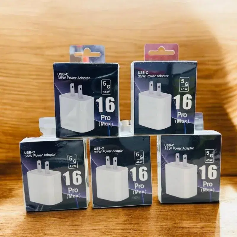 Apple 35W Dual USB-C Port Power Adapters designed for fast charging devices like the MacBook Air, iPhone, and iPad.