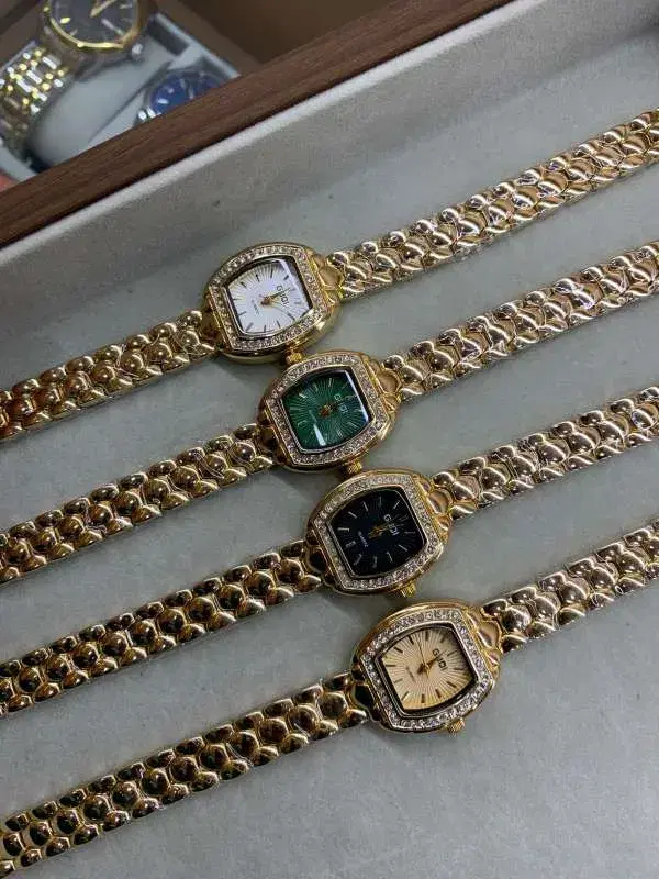 fashion watches feature square dials with stone-set bezels and gold-tone chain bracelets.