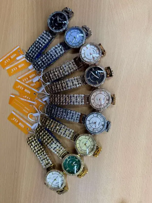 Miracle branded women's watches featuring rhinestone-encrusted bands and analog dials.