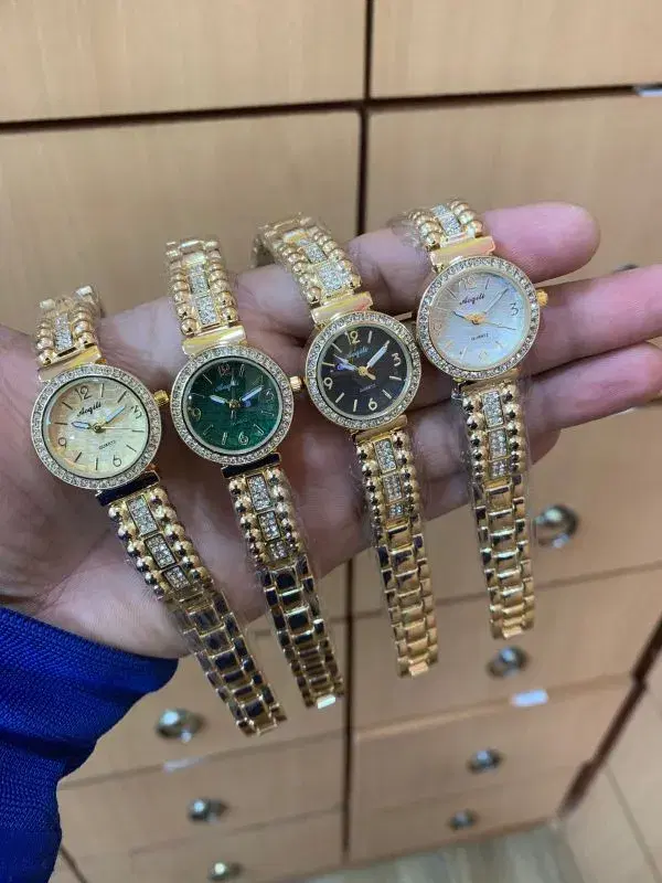 diamond-studded gold-plated quartz wristwatches for women.
