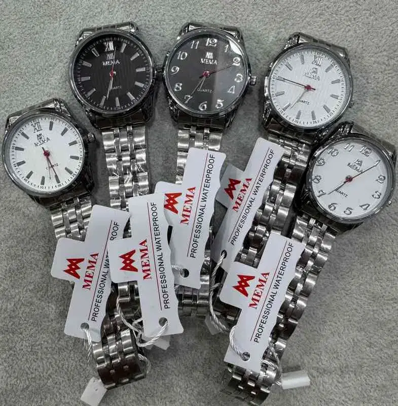 MEMA brand quartz watches feature stainless steel chains round dials in black or white, and are marked as waterproof.