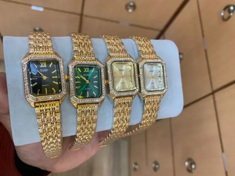 GUQI luxury-style women's quartz wristwatches.