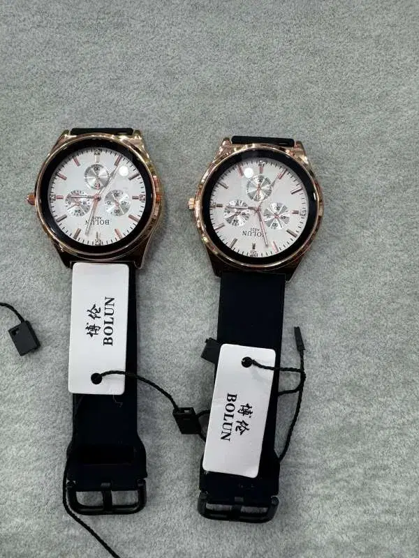 Bolun brand quartz wristwatches featuring multi-function dials and black leather straps.