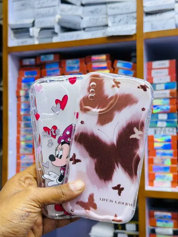 protective cases for smartphones decorated with a butterfly pattern and a cartoon character design.