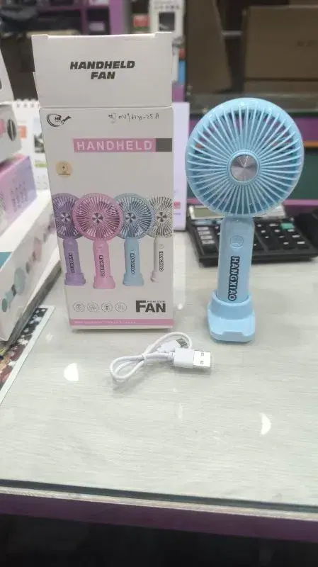 handheld fan, which typically features a rechargeable battery and a USB charging port.