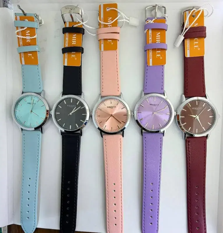 Miracle brand analog wristwatches for women featuring leather bands and assorted colored dials.