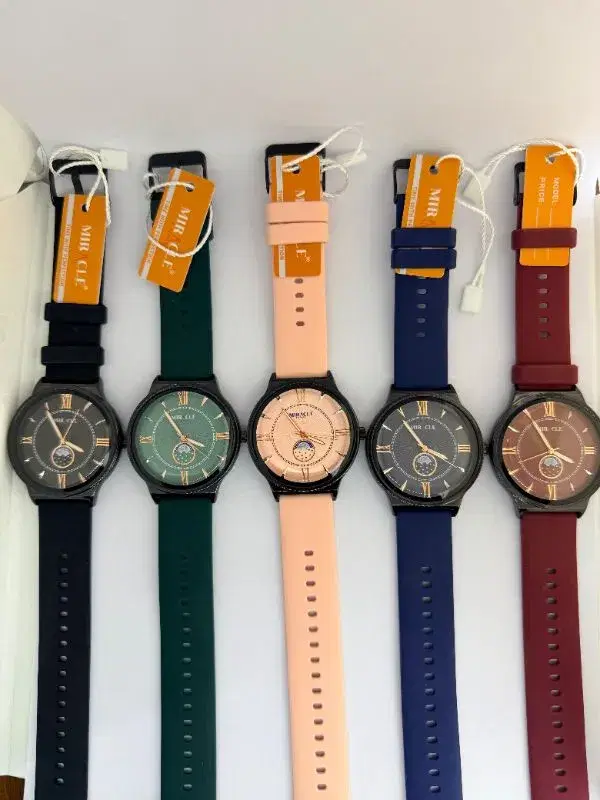 Miracle brand analog wristwatches available in several colors including black, green, beige, blue, and maroon.
