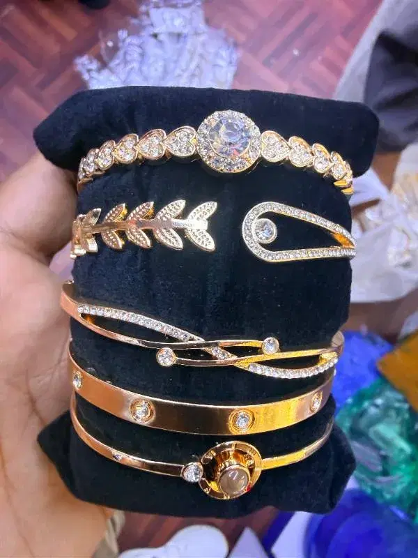 gold-plated bangle bracelets are designed to add a stylish touch to any outfit, often marketed for daily wear or as accessories for women.