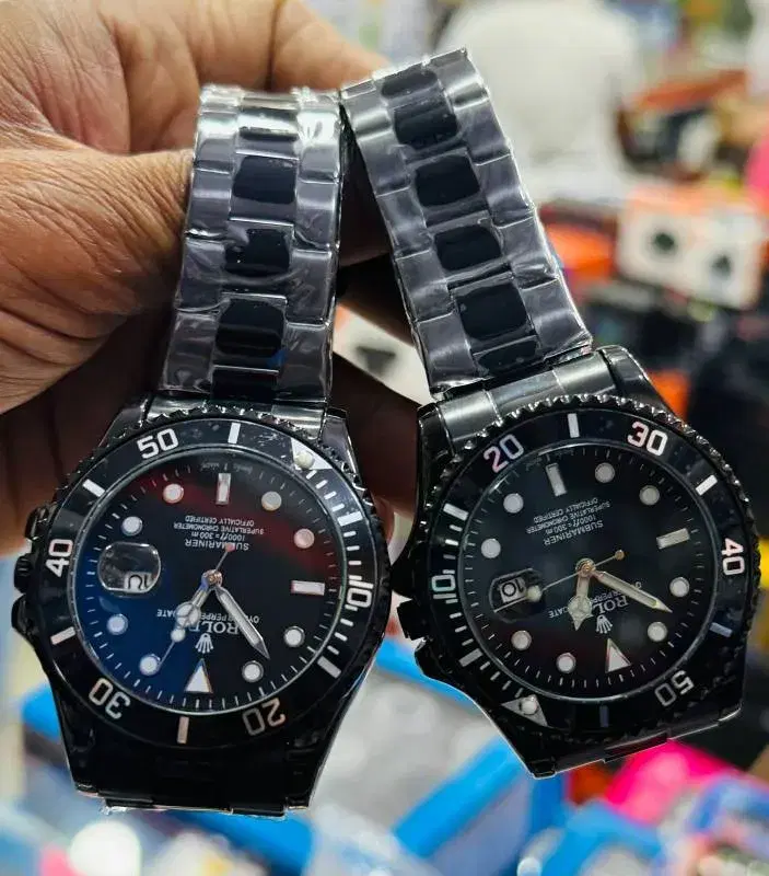 wristwatches that appear to be replicas of the Rolex Submariner Date.