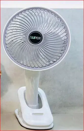 portable, rechargeable clip-on USB fan, likely the Super Desk Fan
