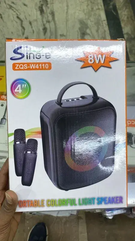 Sing-e ZQS-W4110 portable karaoke speaker system.