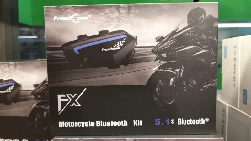 FreedConn FX Motorcycle Bluetooth Kit, a communication system designed for helmet use.