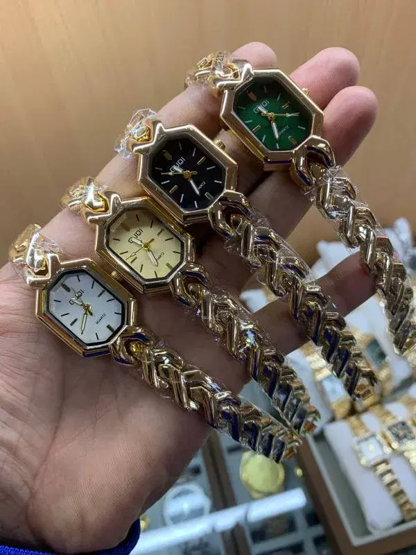 women's wristwatches feature a gold-colored octagonal case