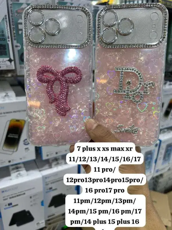 decorative, crystal-embellished protective covers designed for various Apple iPhone models.