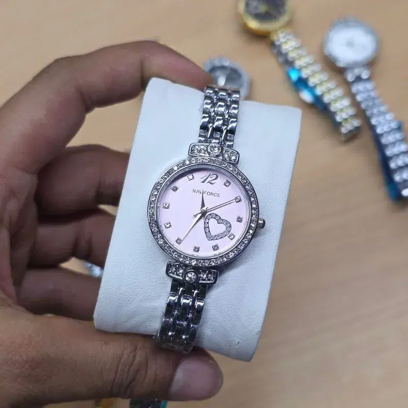 women's analog wristwatch by NAVIFORCE