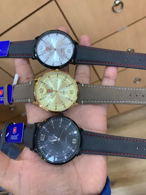 Focus brand quartz watches with leather straps.