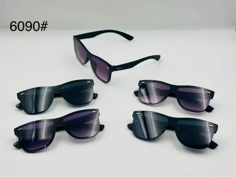 Ray-Ban Wayfarer style sunglasses featuring a black frame and gradient lenses.