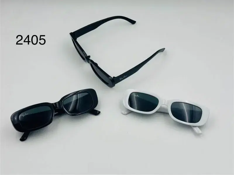 fashionable sunglasses with narrow rectangle frames in black and white.