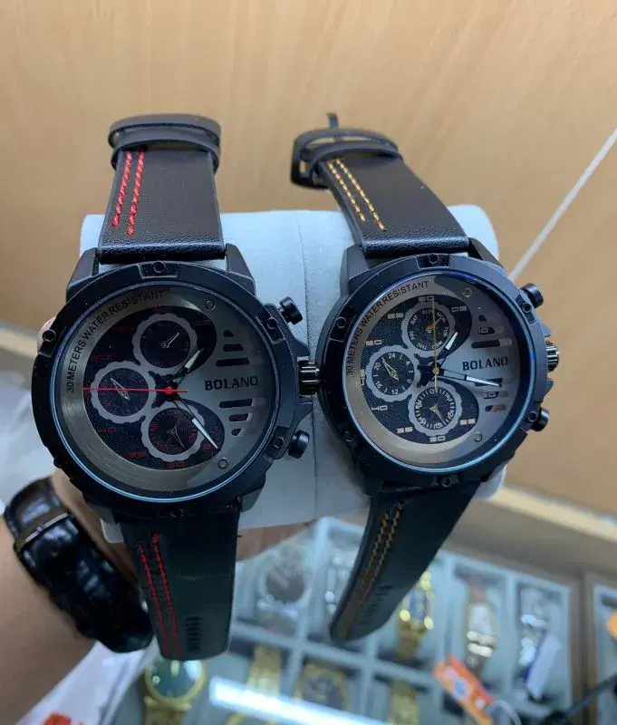 Bolano men's watches featuring black leather straps with red stitching, a stainless steel case