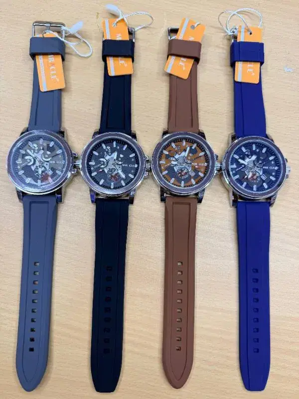 Miracle men's automatic skeleton wristwatches with rubber straps.