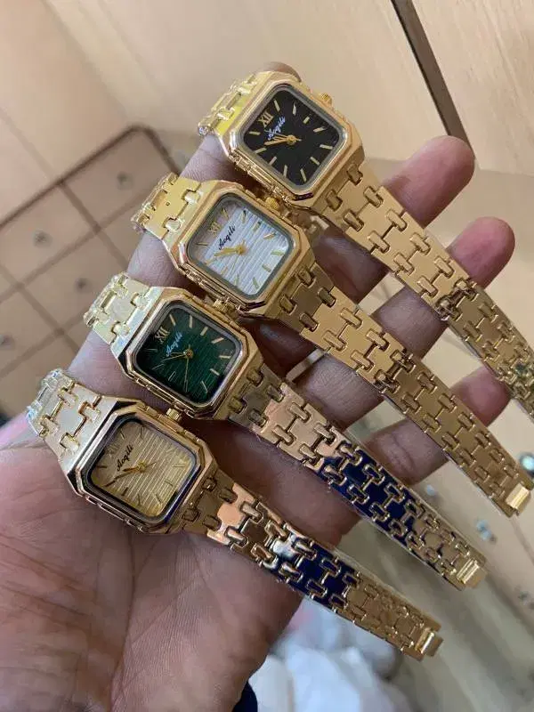 gold-toned Aogili quartz watches featuring rectangular dials and matching link bracelets.