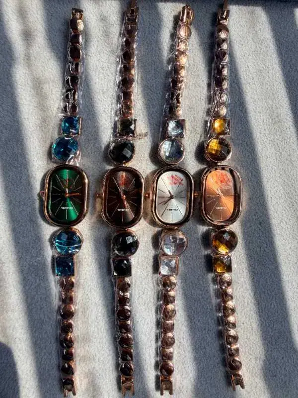 women's bracelet watches featuring oval-shaped dials in different colors