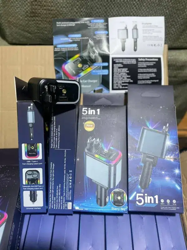 Generic Starry Sky 5-in-1 Retractable Car Charger in black featuring multiple fast-charging ports and extendable cables.