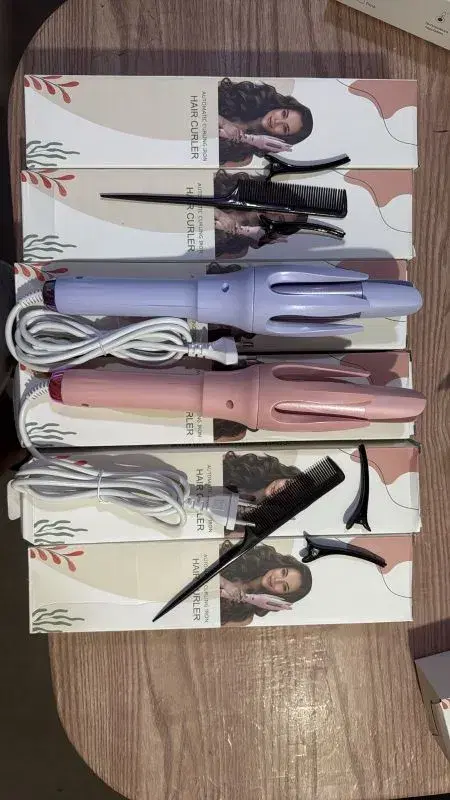 Automatic Hair Curlers featuring 4 temperature settings and dual-voltage capabilities