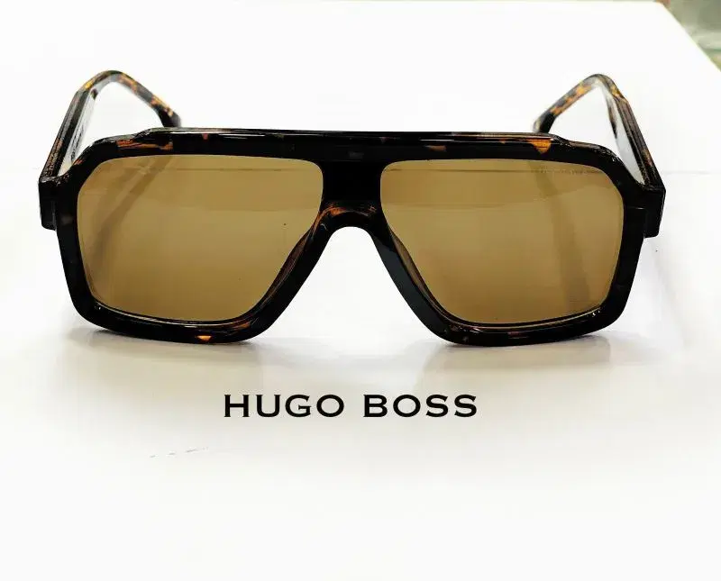 black Hugo Boss square sunglasses feature dark lenses