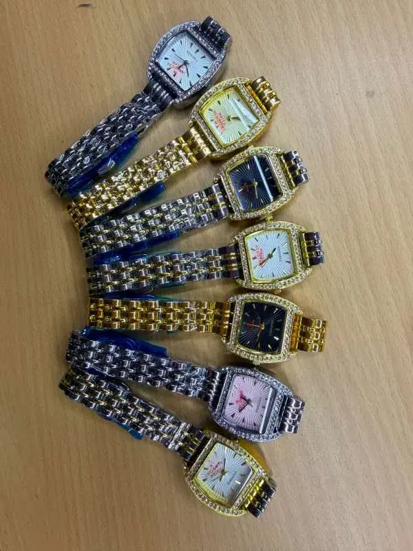 women's fashion watches feature square, rhinestone-studded dials and are available in silver, gold, and two-tone finishes.