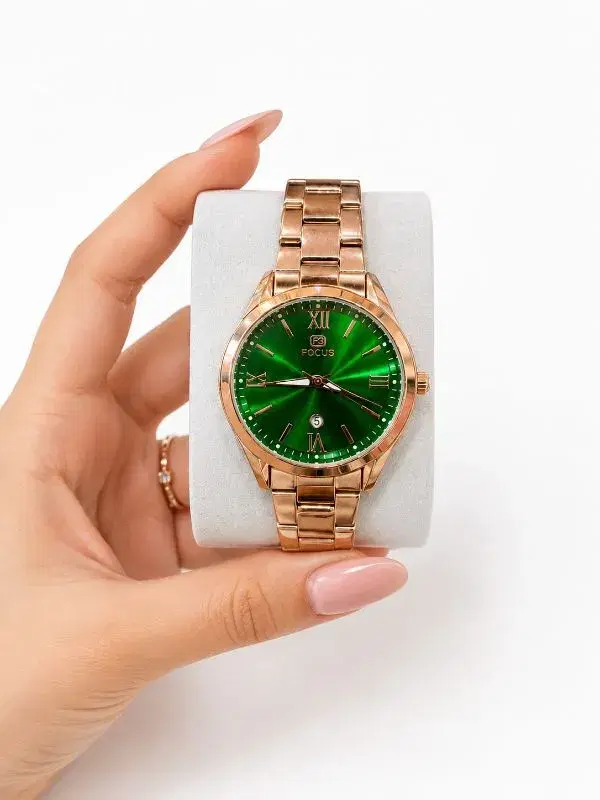 Focus brand wristwatch features a vibrant green analog dial enclosed in a rose gold stainless steel case and matching bracelet.