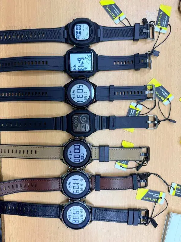 digital sports watches feature black resin or textured rubber straps